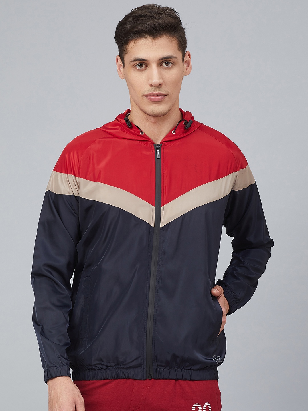 

Chkokko Men Navy Blue & Red Colourblocked Hooded Windcheater Running Bomber Jacket