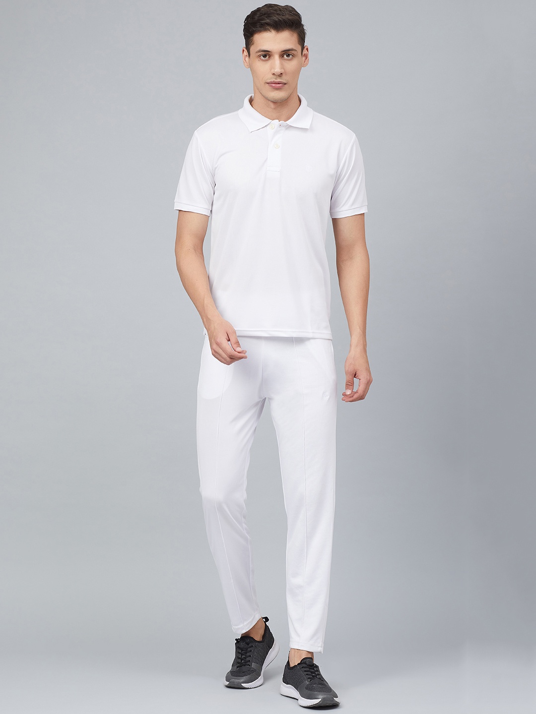 

Chkokko Men White Solid Cricket Track Suit
