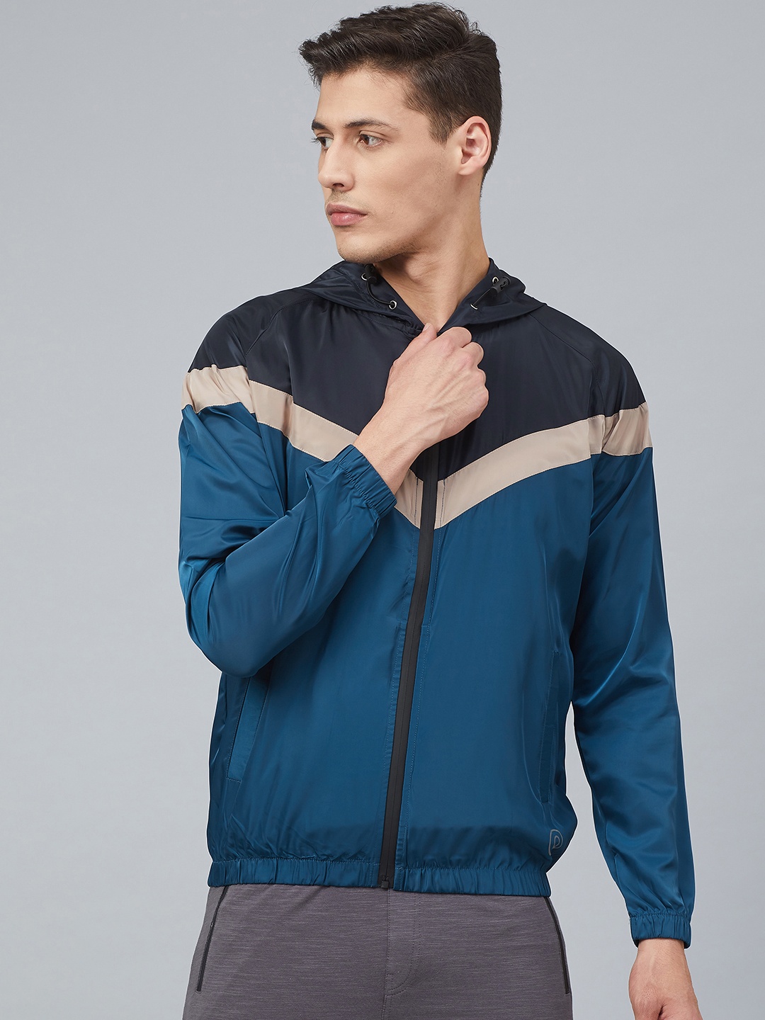 

Chkokko Men Blue & Beige Colourblocked Hooded Windcheater Running Jacket