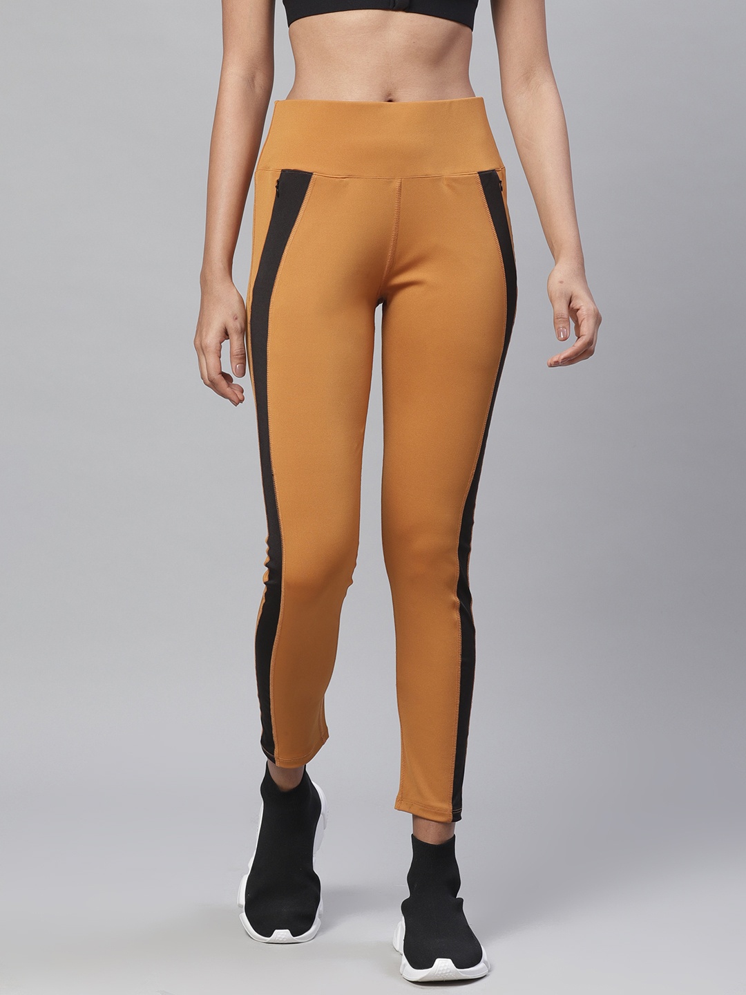 

CHKOKKO Women Mustard Yellow Solid Gym Tights