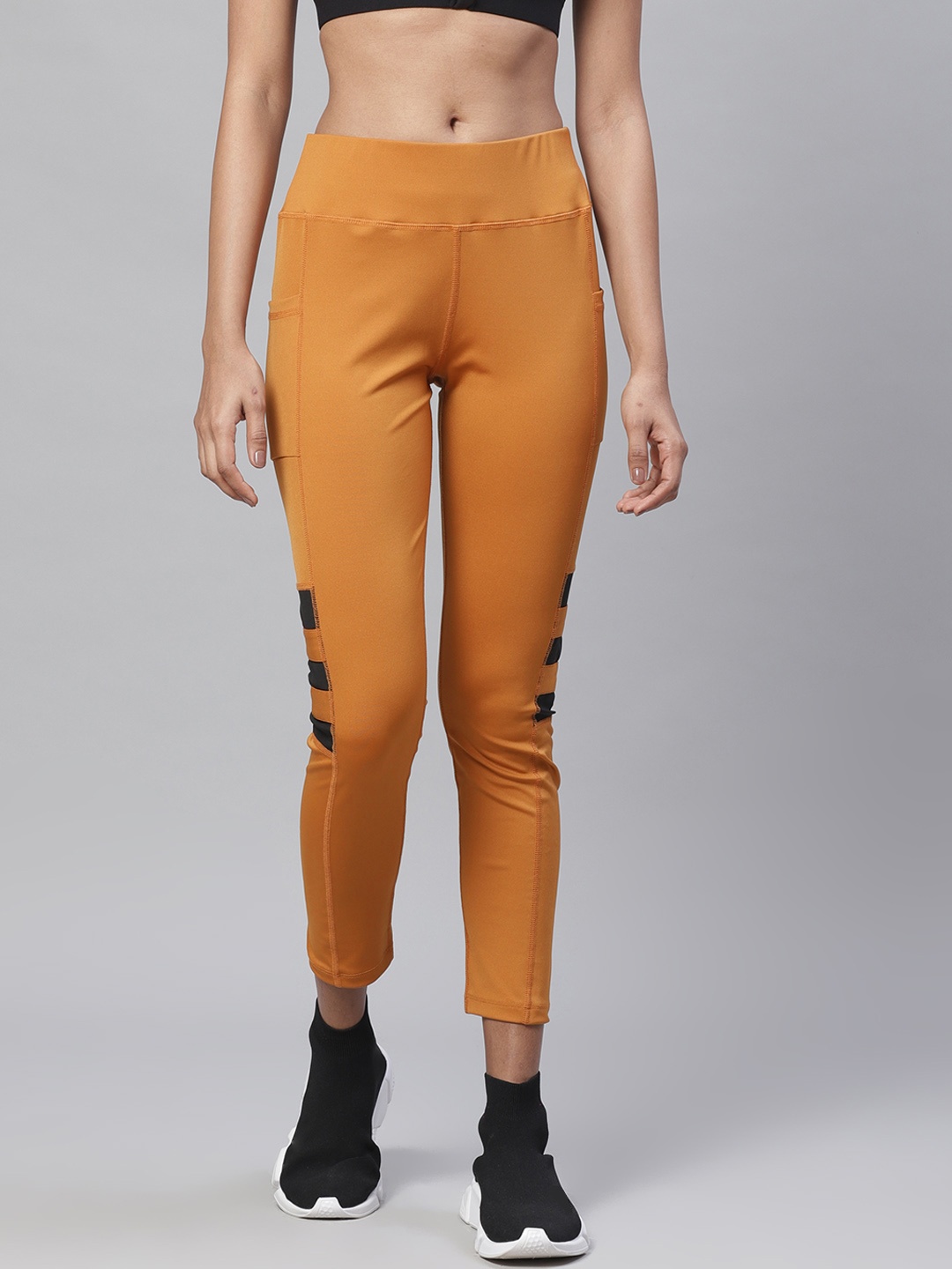 

CHKOKKO Women Mustard Yellow Solid Cropped Yoga Tights