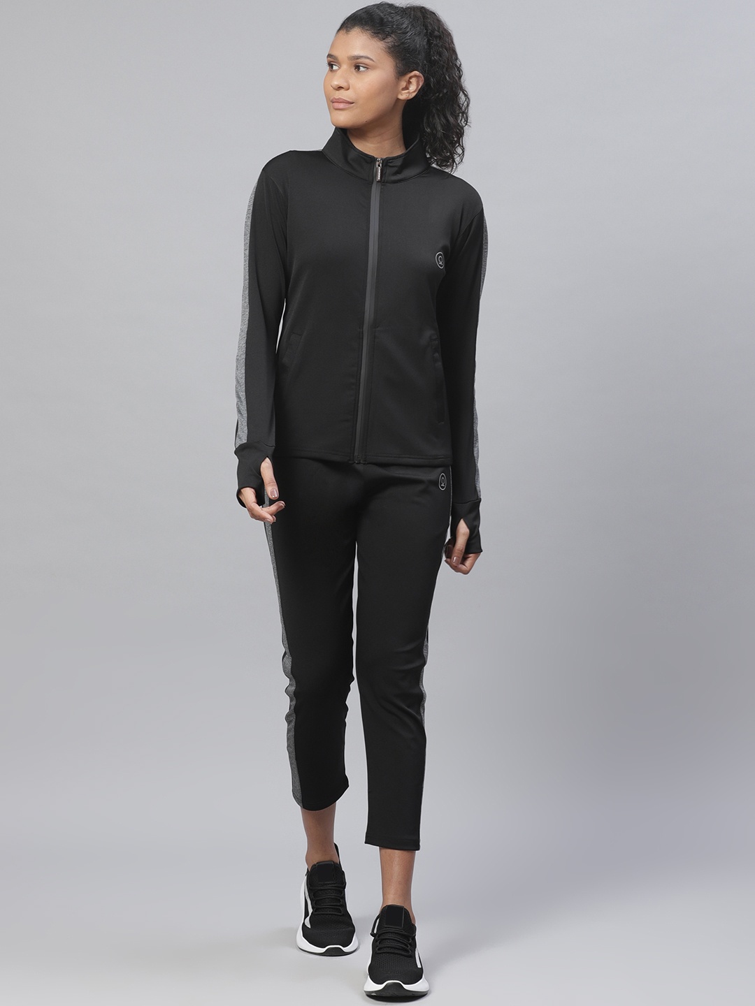 

CHKOKKO Women Black Solid Training Tracksuit