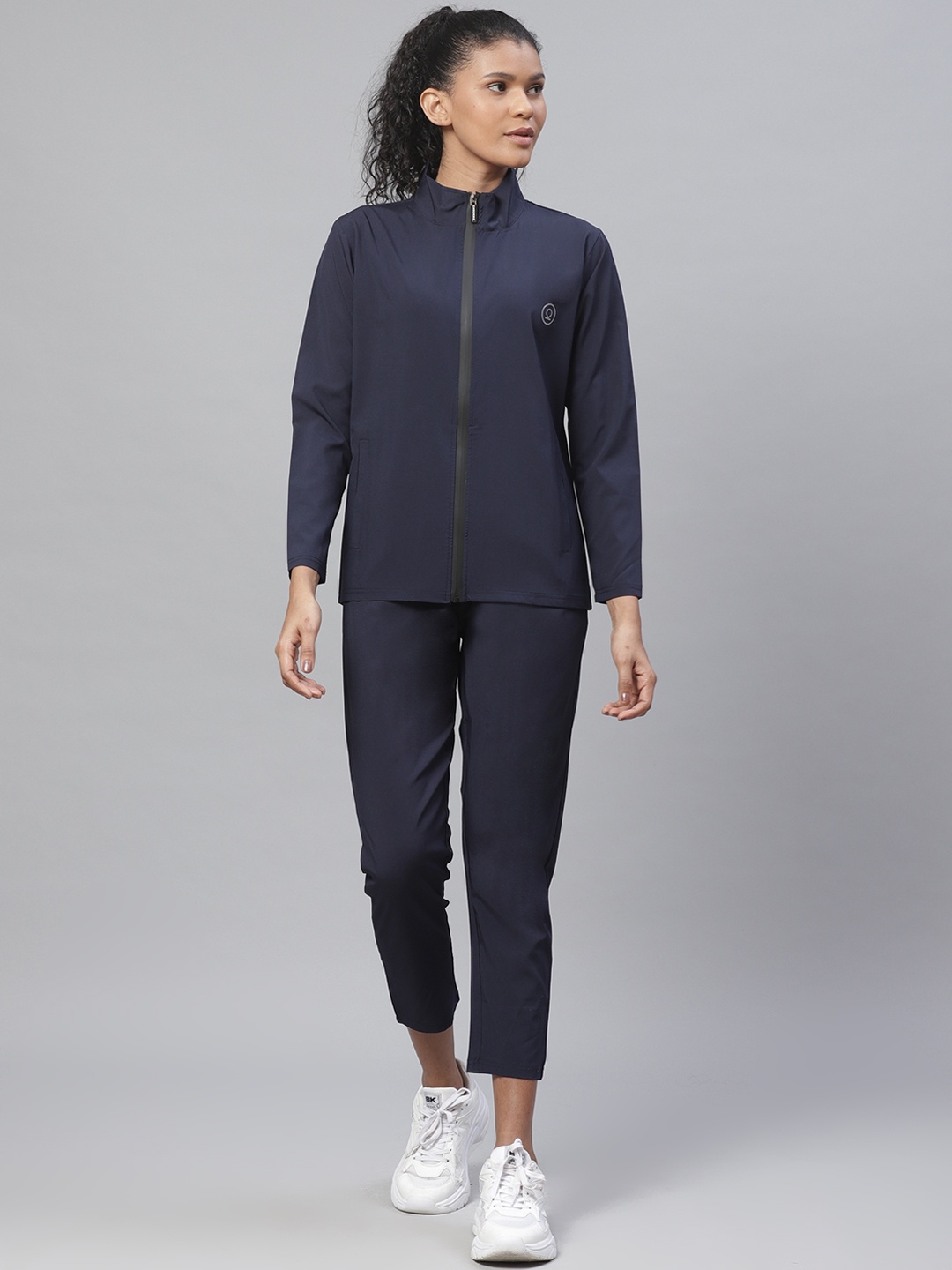 

Chkokko Women Navy Solid Training Tracksuit, Navy blue