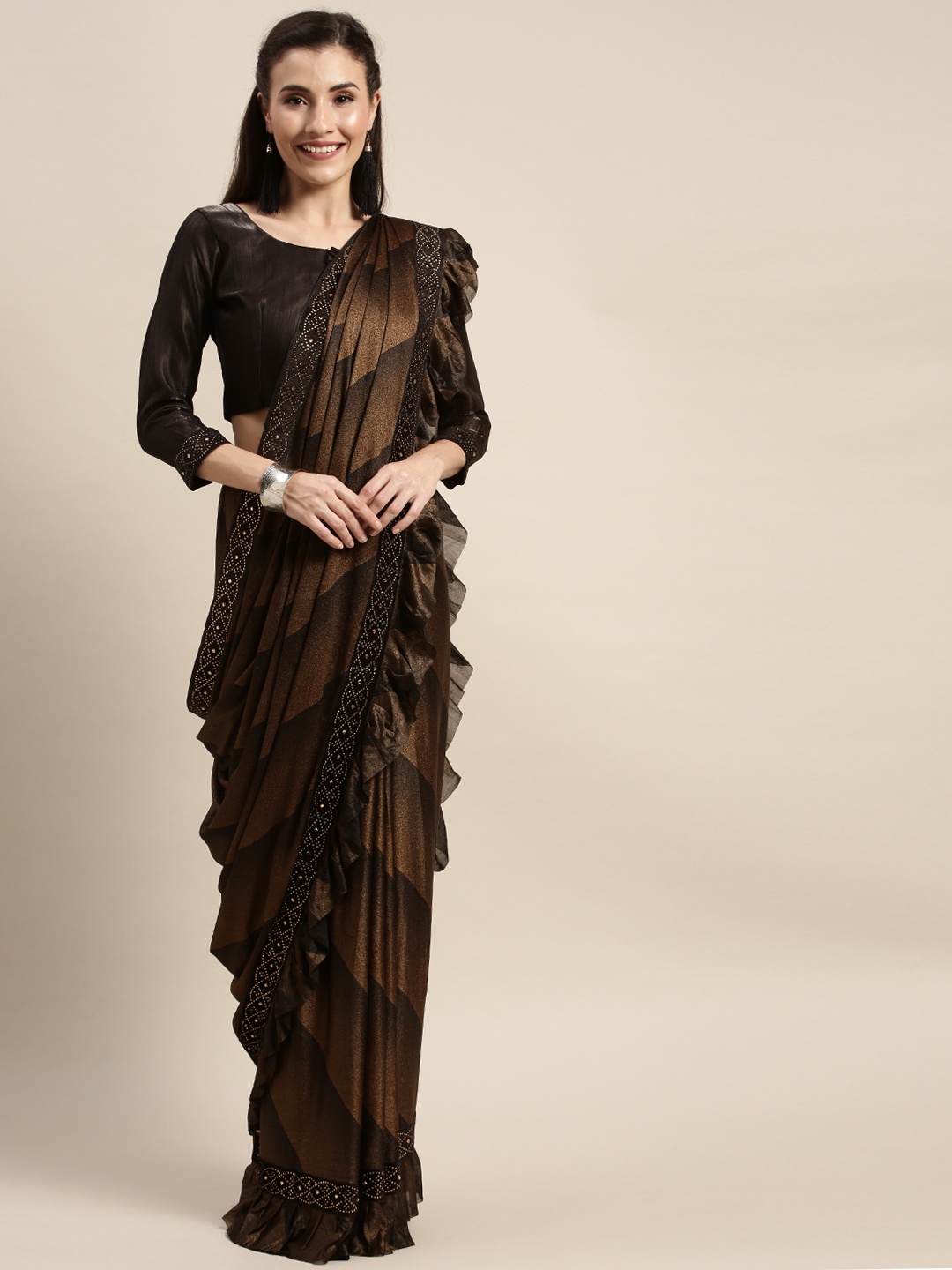 

Amrutam Fab Brown Silk Blend Striped Block Print Saree with Ruffle border