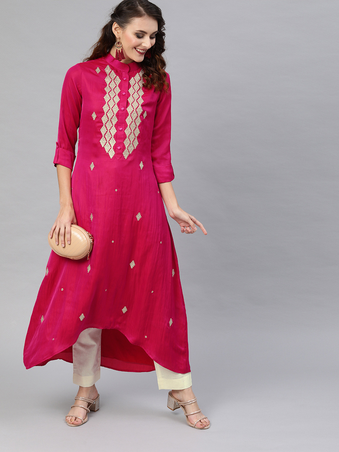 

Inddus Women Magenta Pink & Off-White Embroidered Kurta with Trousers