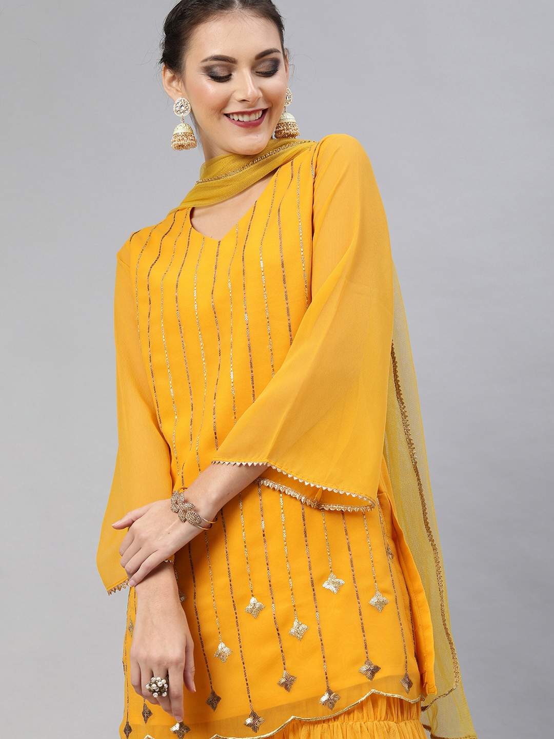 

Inddus Women Mustard Yellow Embroidered Kurti with Sharara & Dupatta