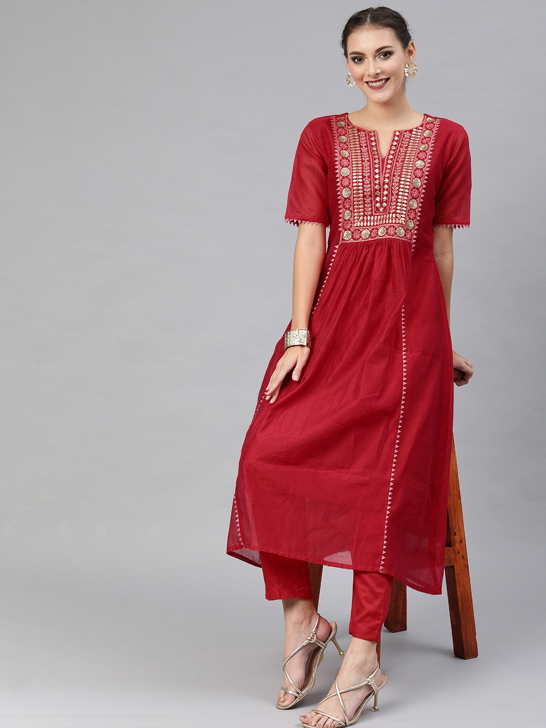 

Inddus Women Red Embroidered Kurta with Trousers