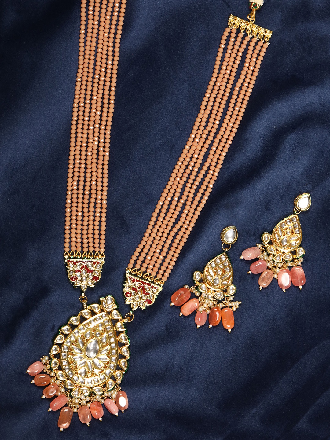 

Priyaasi Peach-Coloured Gold-Plated Kundan Studded & Beaded Handcrafted Jewellery Set