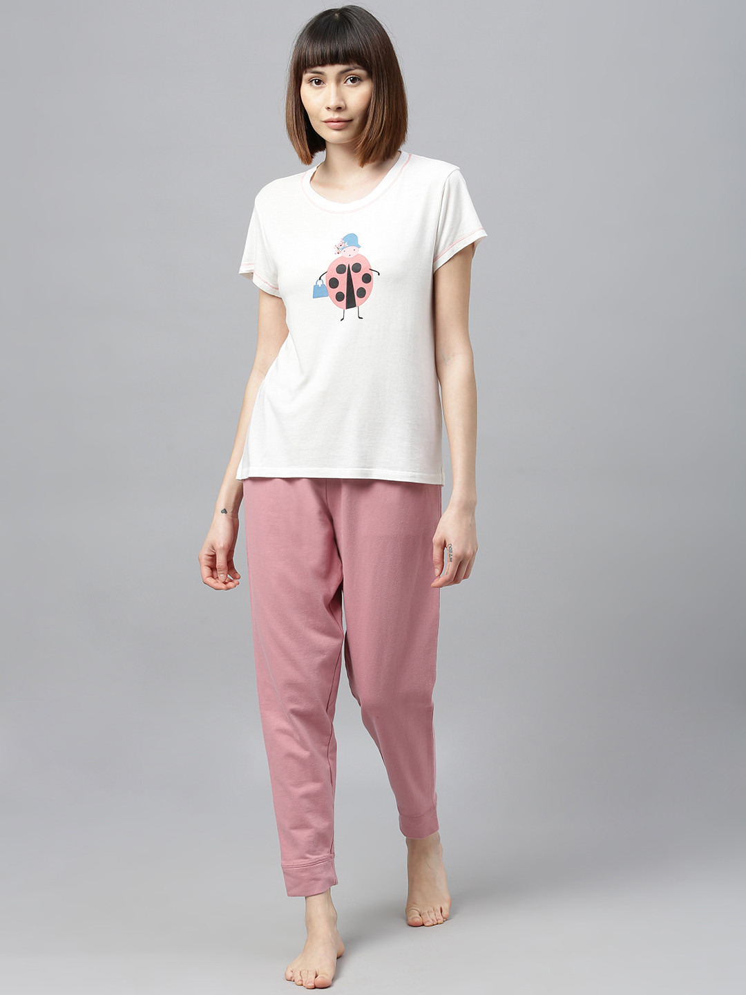 

Chemistry Women Cream-Coloured Printed Tshirt & Pink Solid Pyjamas Night suit