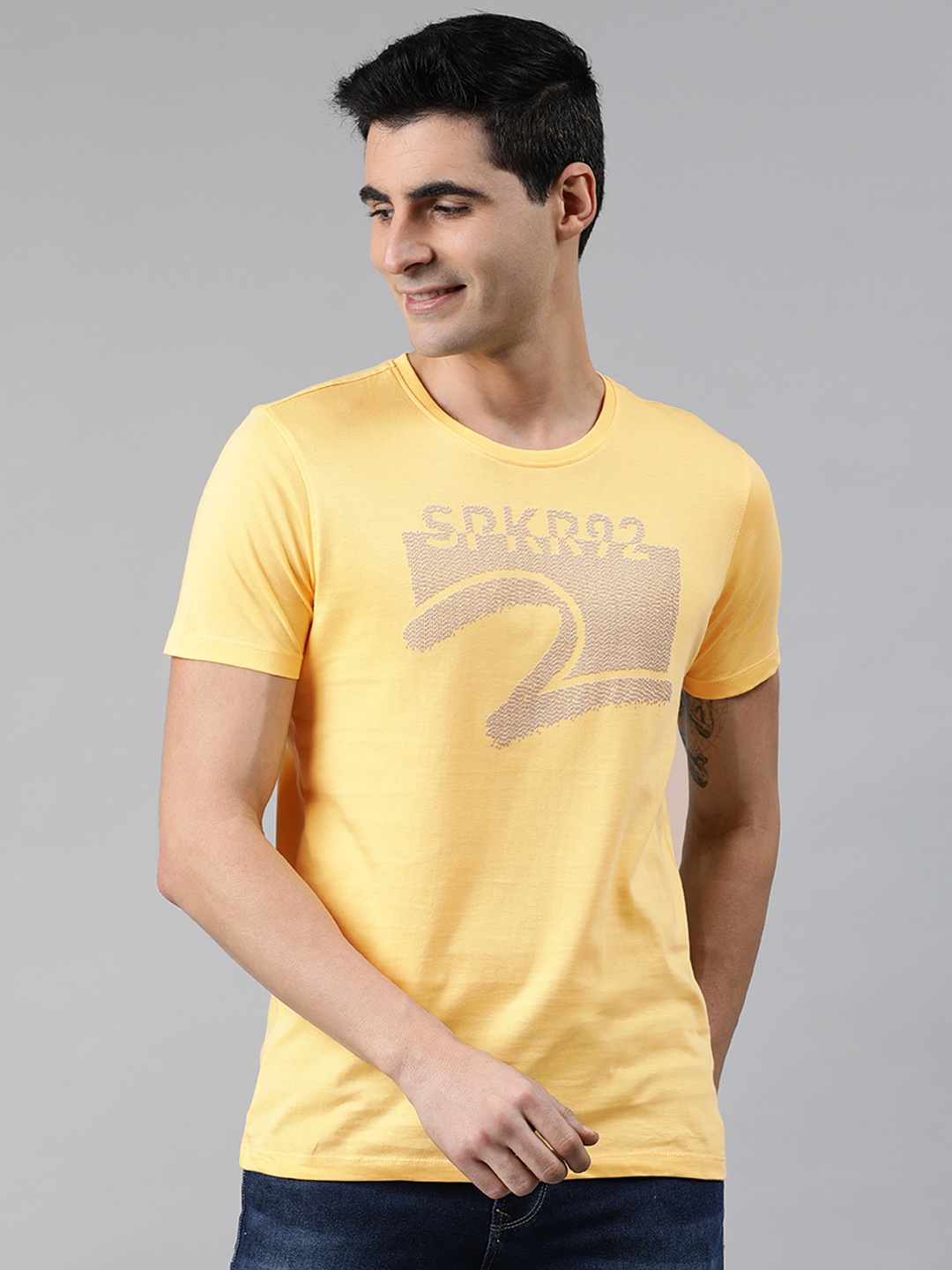 

SPYKAR Men Yellow Slim Fit Brand Logo Printed Round Neck Pure Cotton T-shirt