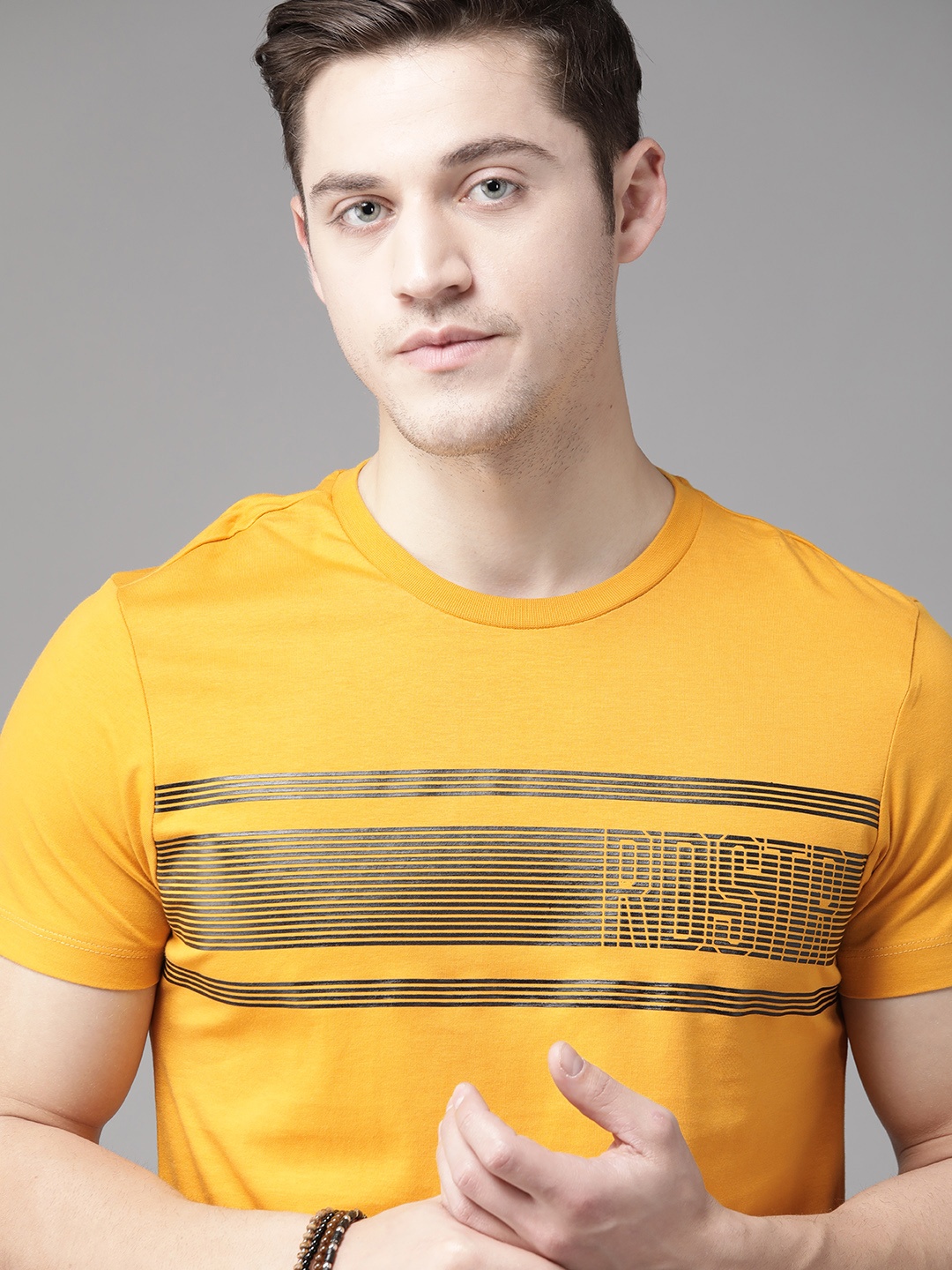 

Roadster Men Yellow & Black Pure Cotton Striped Round Neck T-shirt