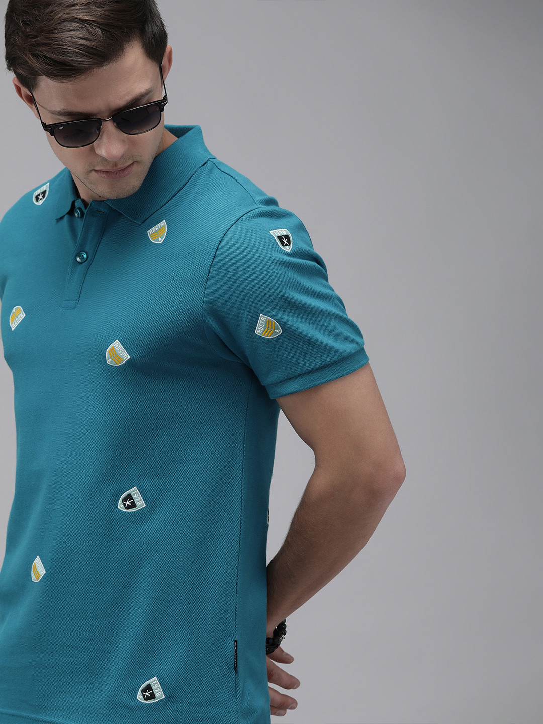 

Roadster Men Teal Blue Embroidered Polo Collar T-shirt