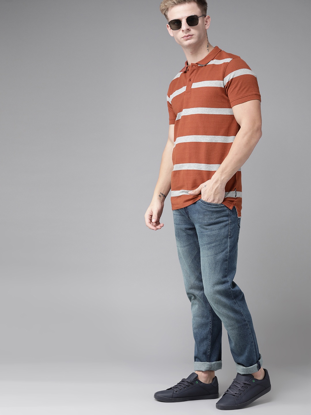 

Roadster Men Rust Orange & Grey Melange Striped Polo Collar T-shirt