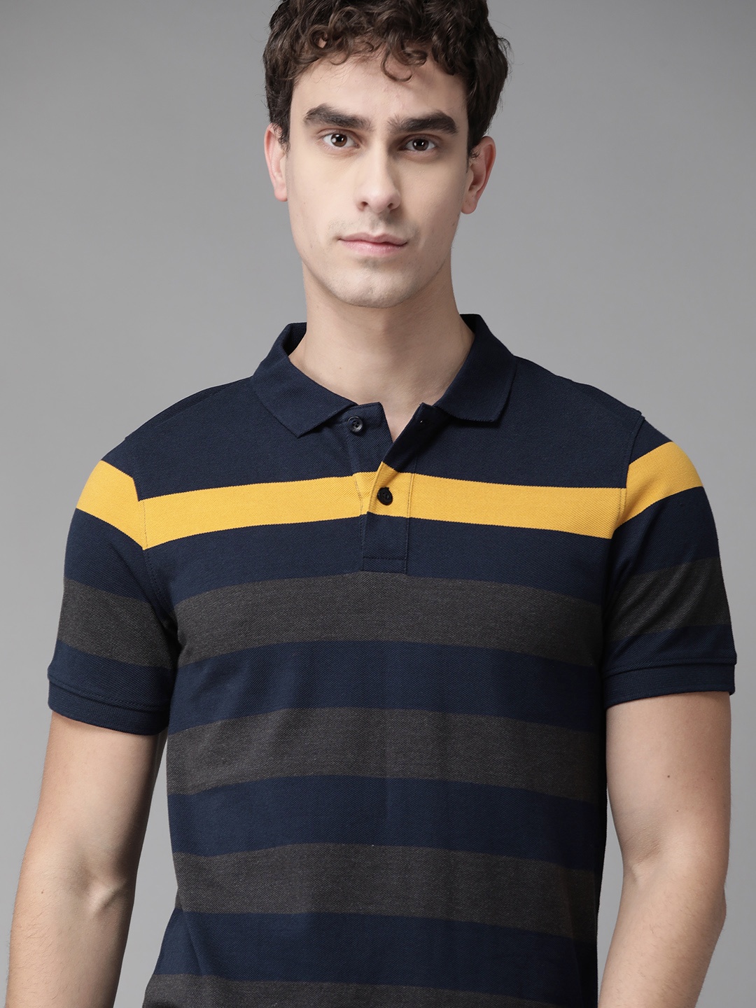 

Roadster Men Navy Blue & Charcoal Grey Striped Polo Collar T-shirt