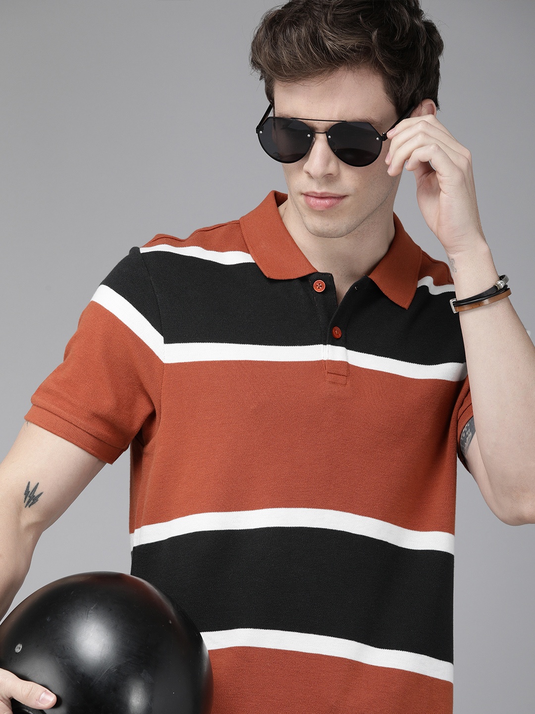 

Roadster Men Rust Brown Black Striped Polo Collar Pure Cotton T-shirt