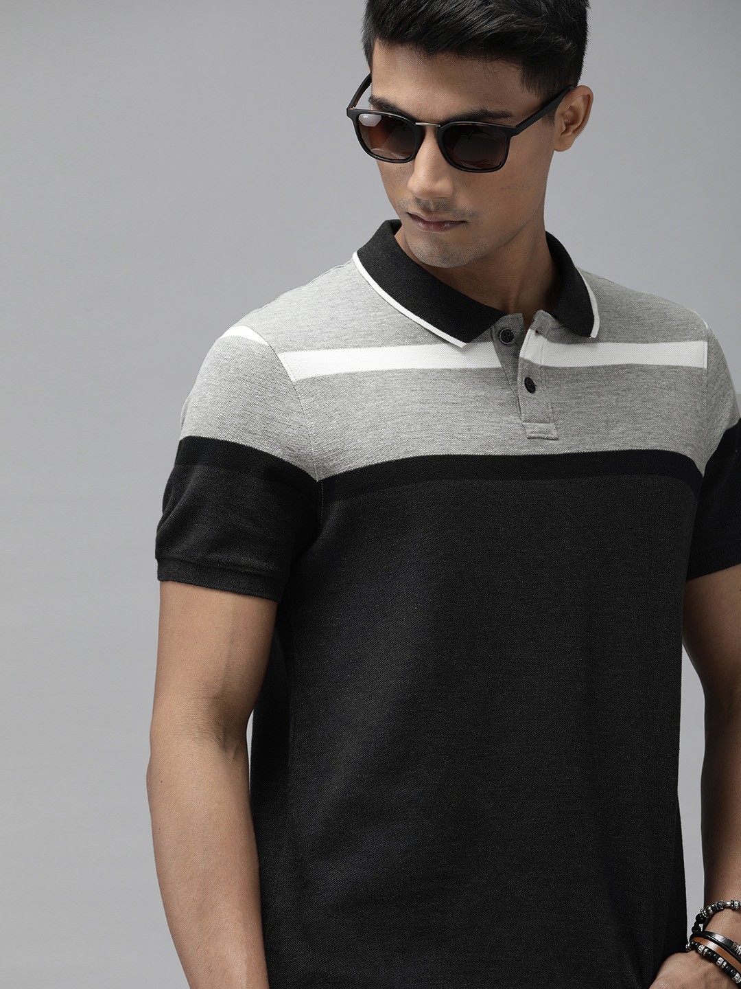 

Roadster Men Charcoal Grey Colourblocked Polo Collar T-shirt