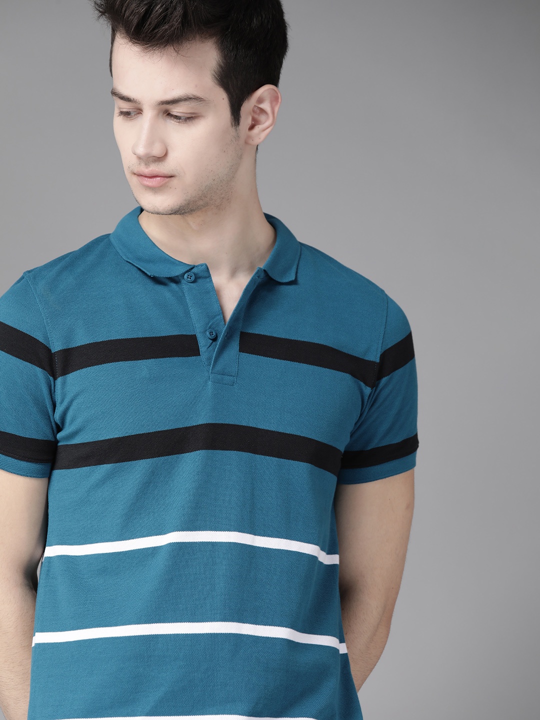 

Roadster Men Blue Striped Polo Collar T-shirt