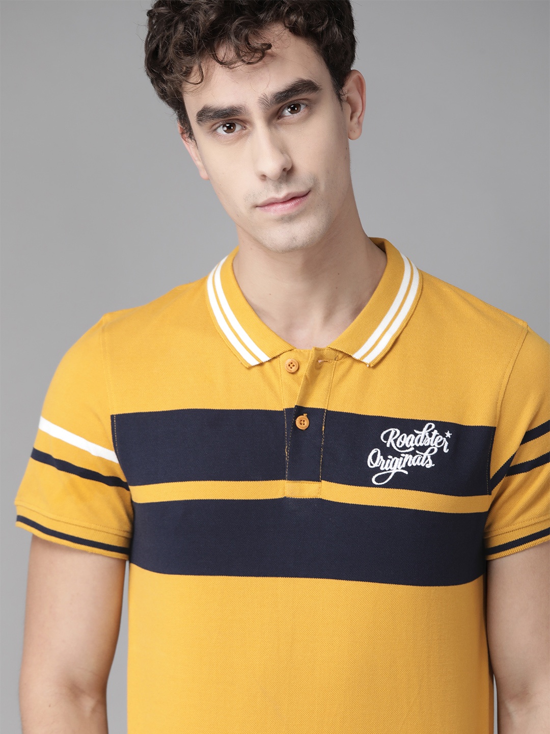 

Roadster Men Yellow & Navy Blue Striped Polo Collar Pure Cotton T-shirt