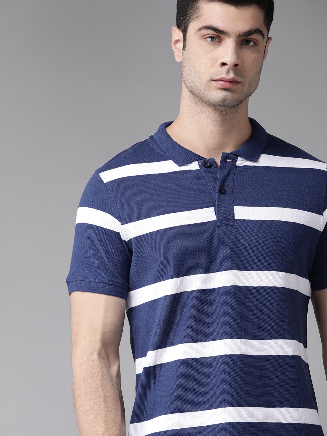 

Roadster Men Navy Blue White Pure Cotton Striped Polo Collar Pure Cotton T-shirt