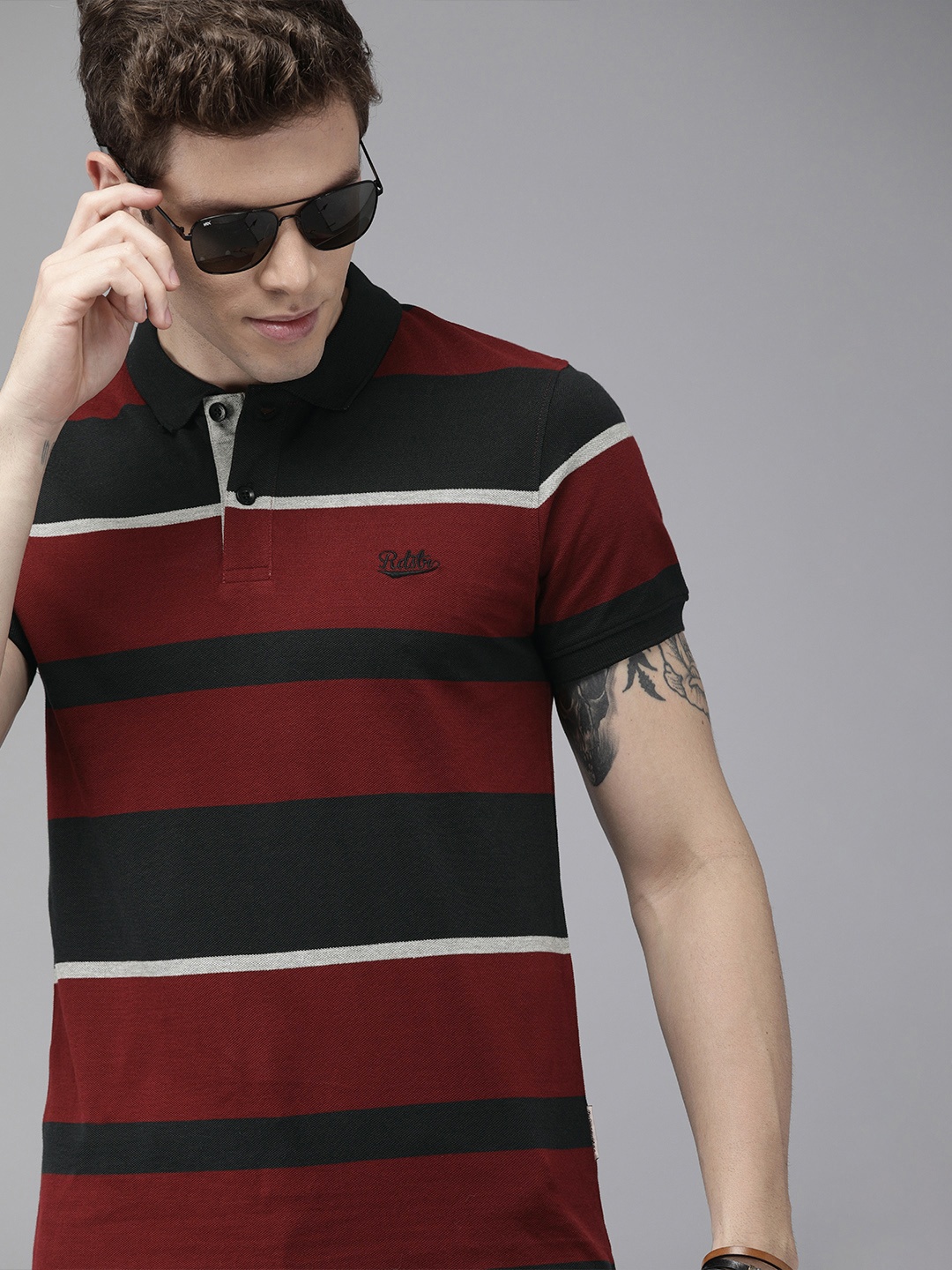 

Roadster Men Maroon & Black Striped Polo Collar T-shirt