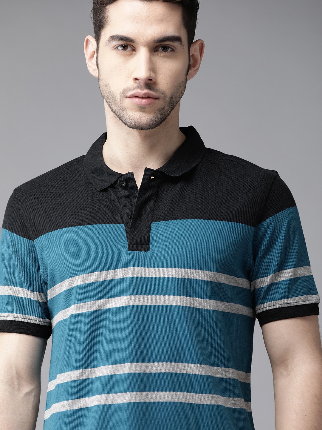 

Roadster Men Blue Striped Pure Cotton Polo Collar Pure Cotton T-shirt