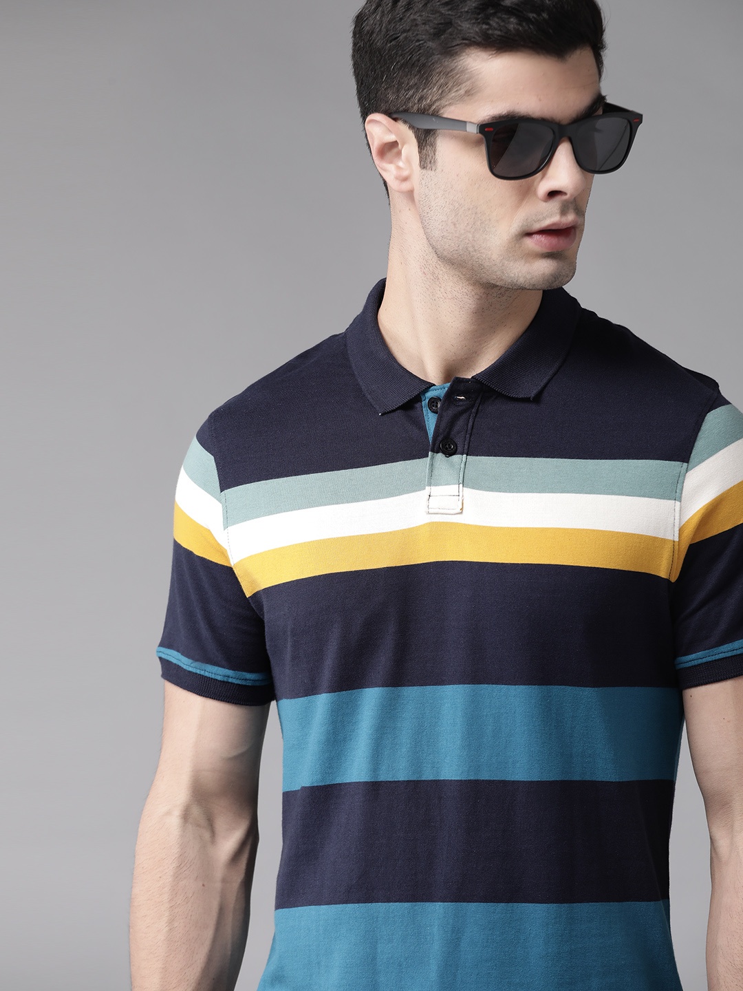 

Roadster Men Blue Striped Polo Collar Pure Cotton T-shirt
