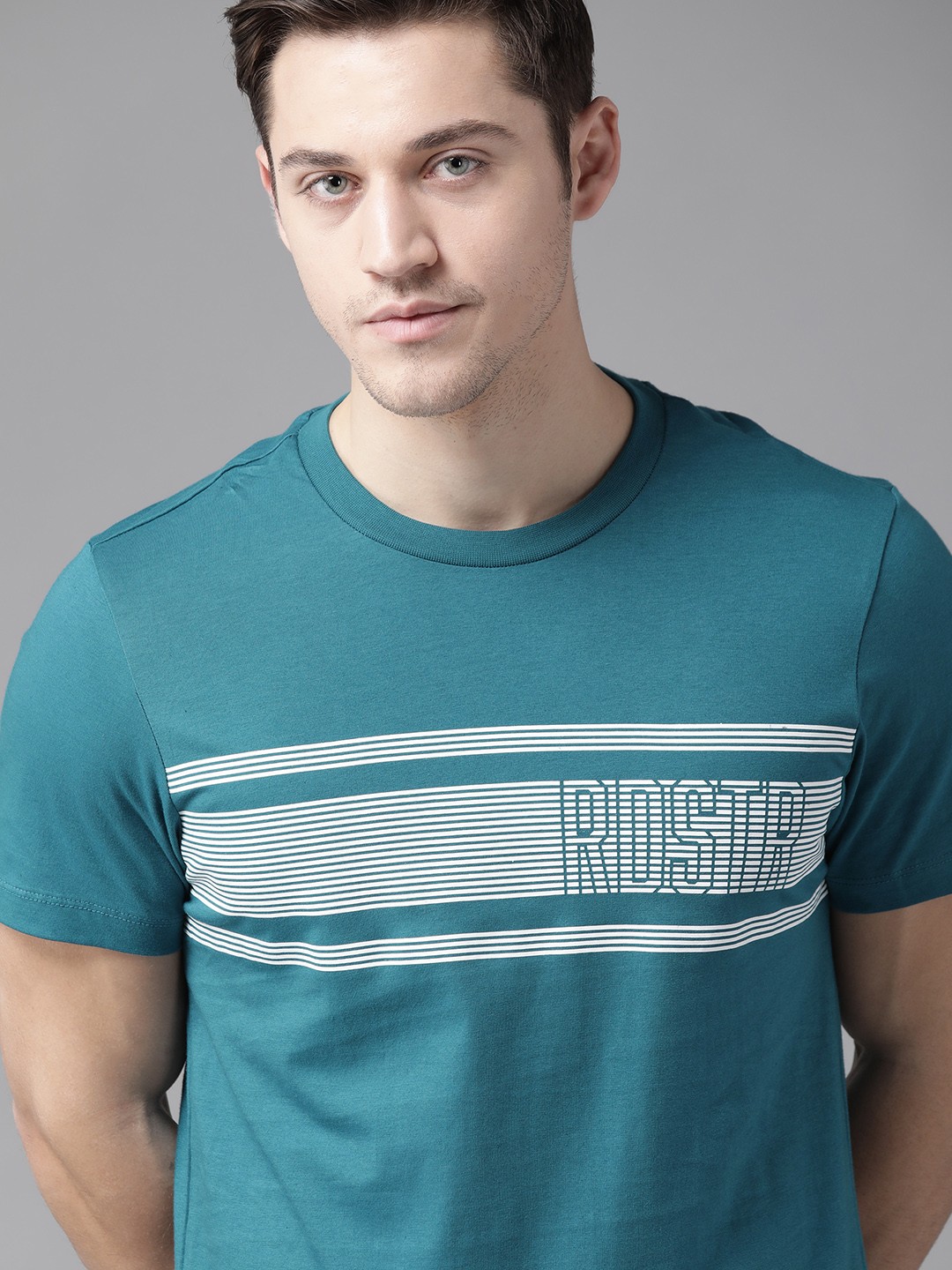 

Roadster Men Blue & White Pure Cotton Striped Round Neck T-shirt