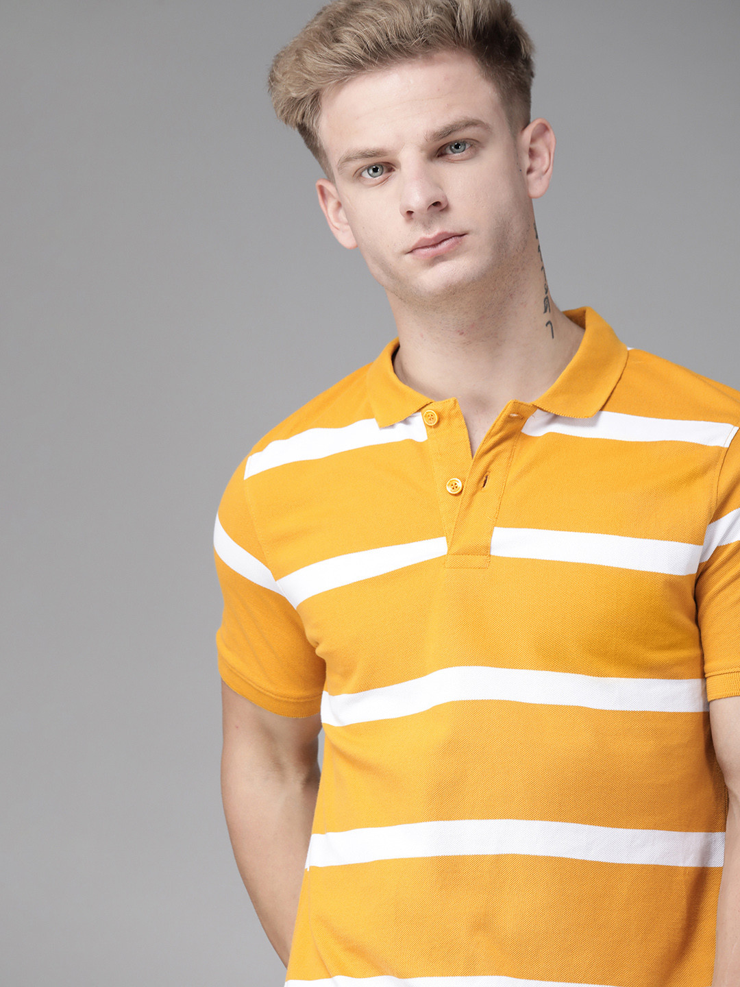 

Roadster Men Mustard Yellow & White Striped Polo Collar T-shirt