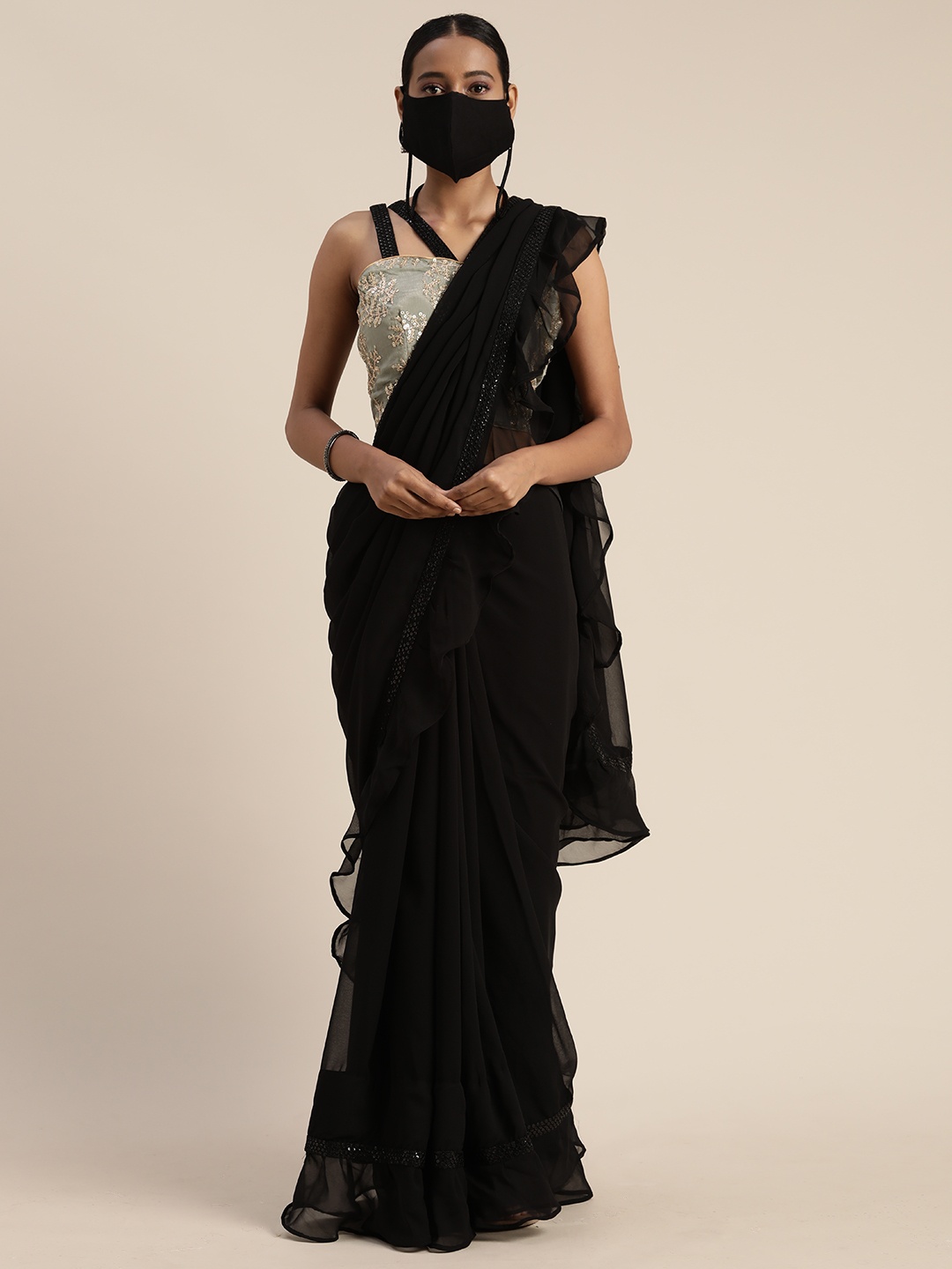 

Ethnovog Black Solid Poly Georgette Saree With Matching Mask