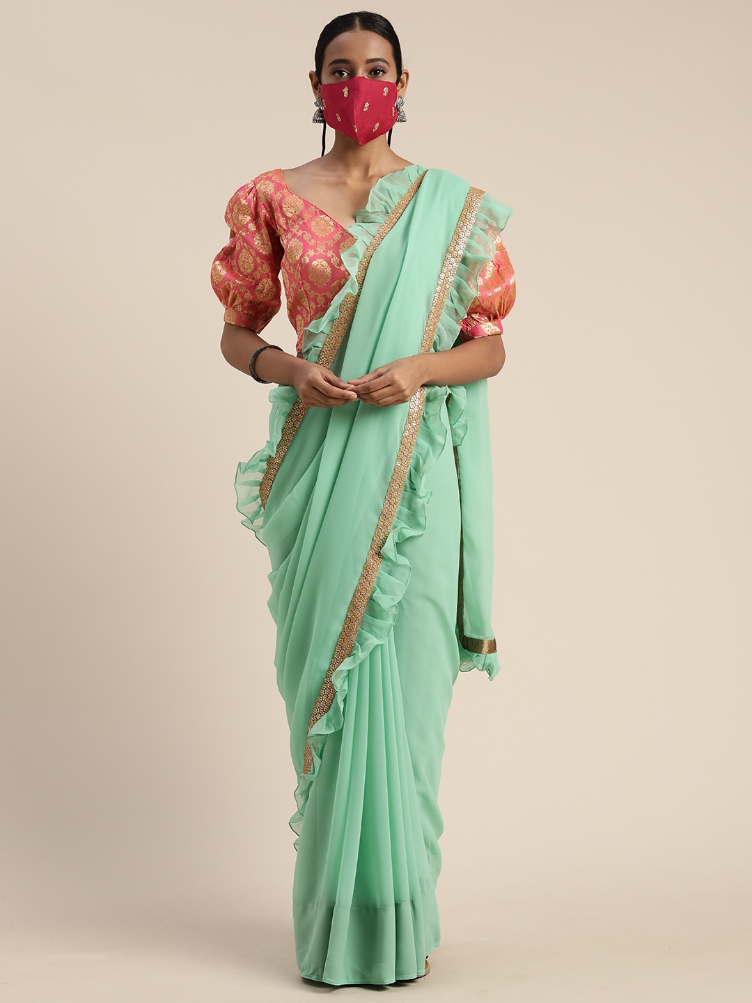 

Ethnovog Sea Green Solid Poly Georgette Saree