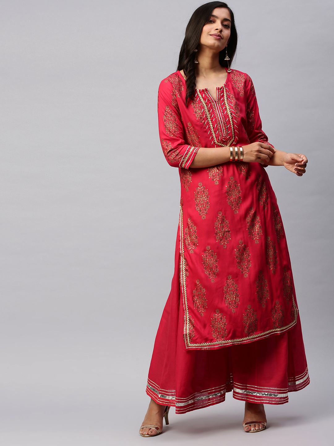

Ishin Women Red Printed Kurta with Palazzos