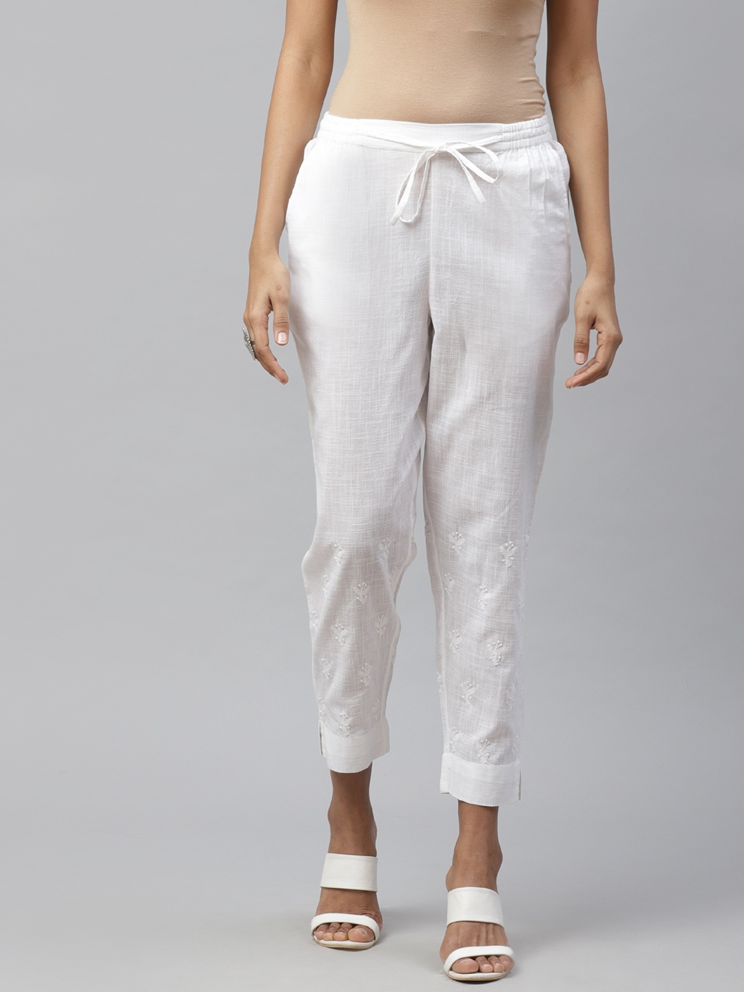

akheri Women White Slim Fit Chikankari Embroidered Detail Regular Trousers