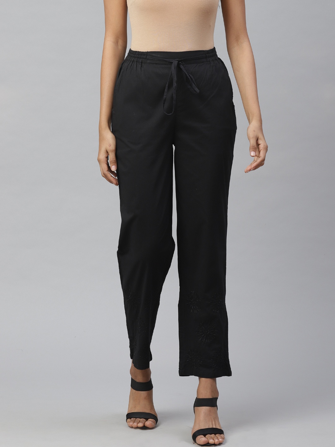 

akheri Women Black Tapered Fit Chikankari Embroidered Detail Regular Trousers