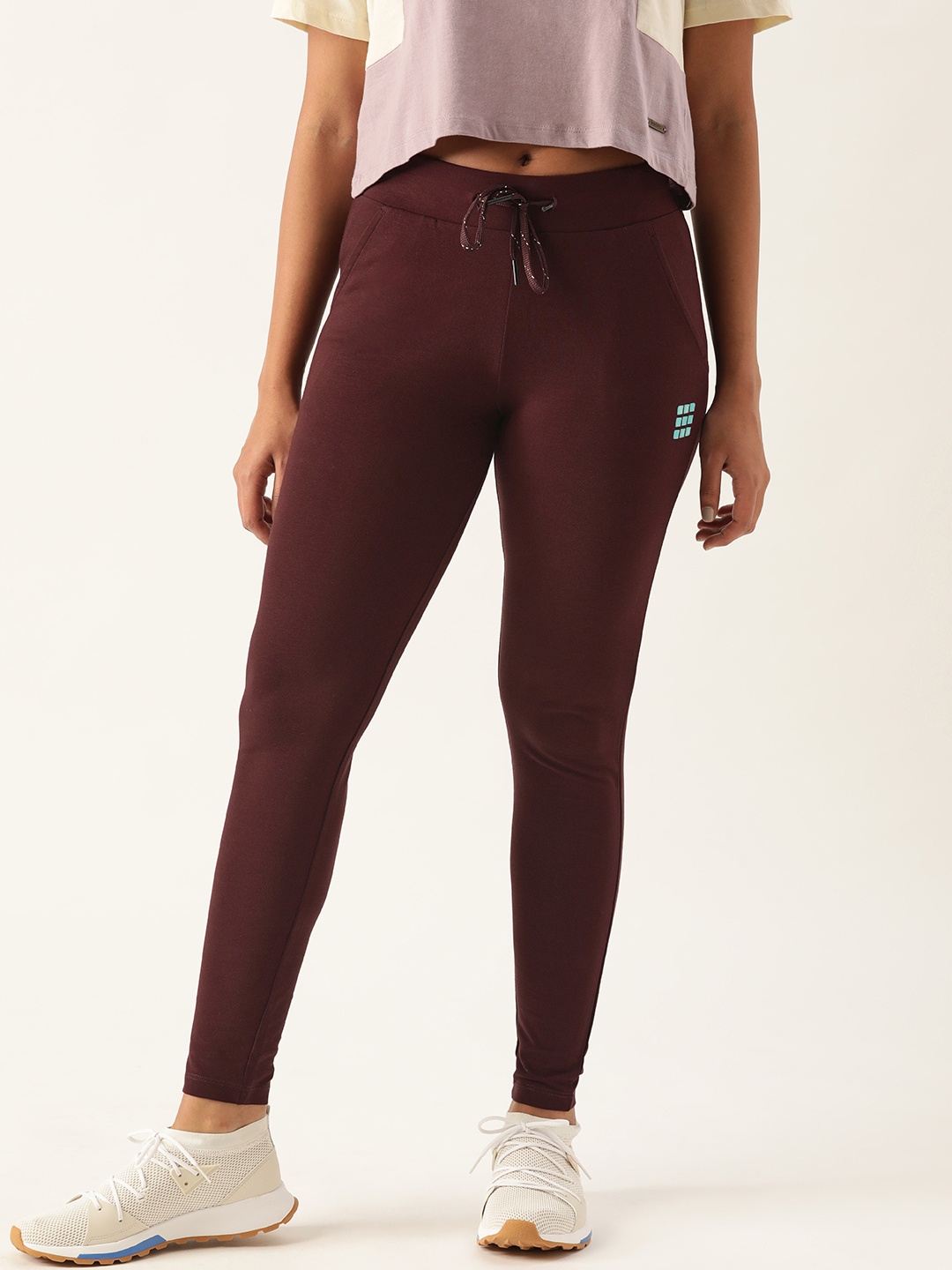 

Sweet Dreams Women Burgundy Solid Fitted Training Track Pants