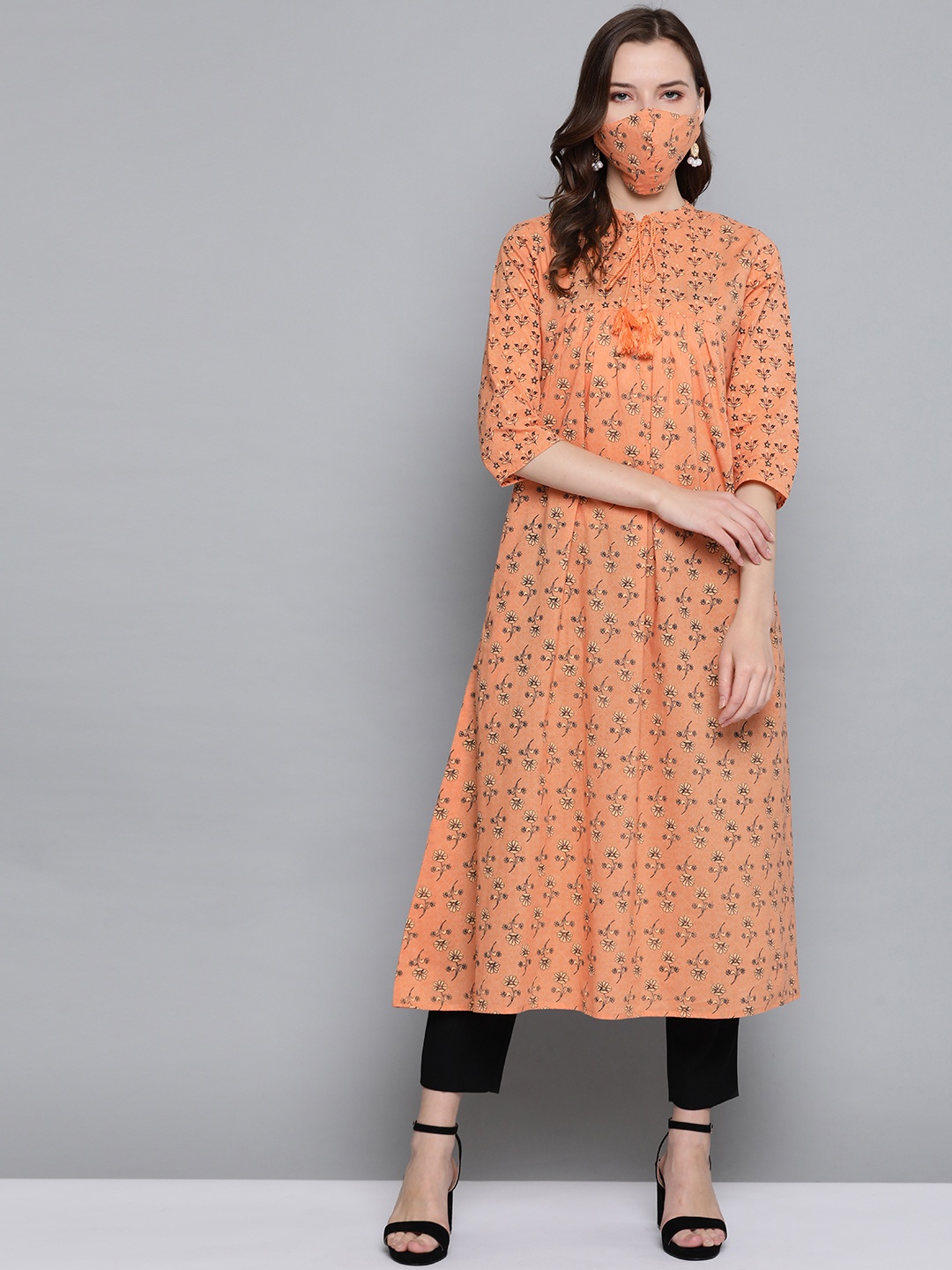 

HERE&NOW Women Orange & Black Floral Printed A-Line Kurta & Mask