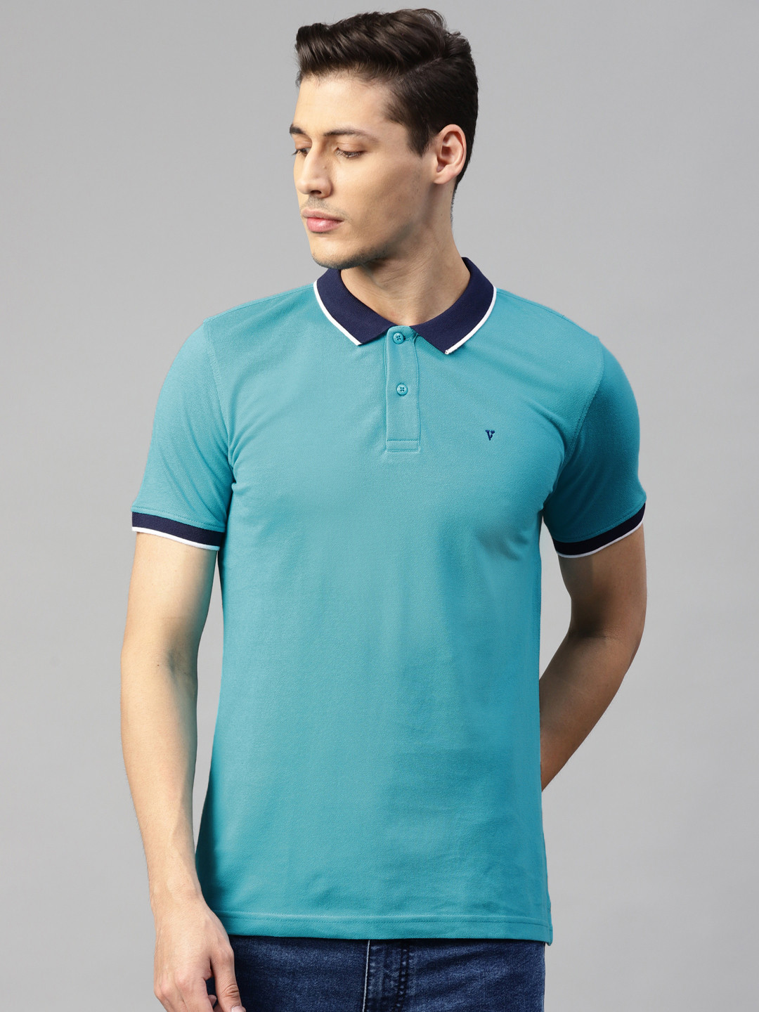 

Van Heusen Sport Men Blue Solid Polo Collar T-shirt