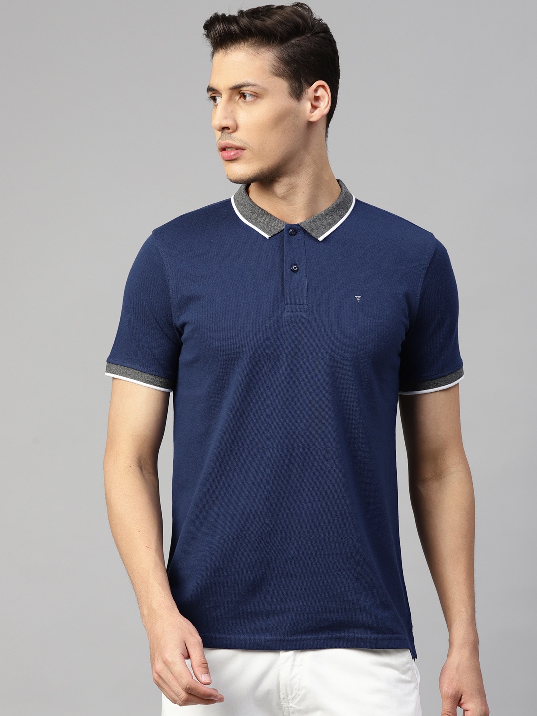 

Van Heusen Sport Men Navy Blue Solid Polo Collar T-shirt