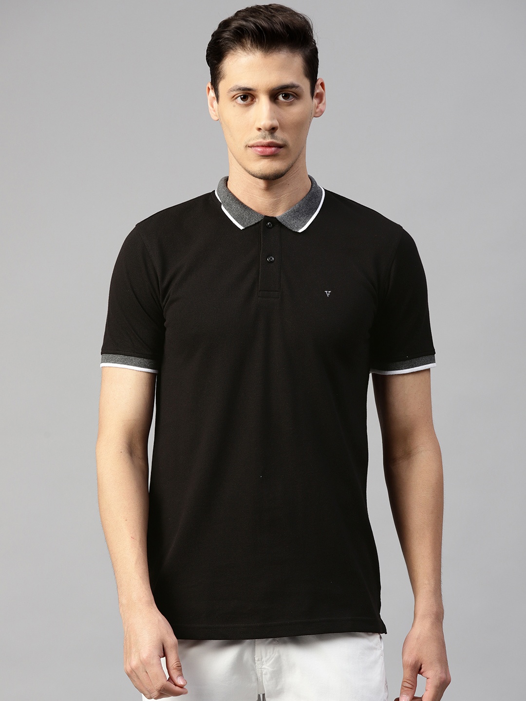 

Van Heusen Sport Men Black Solid Polo Collar T-shirt