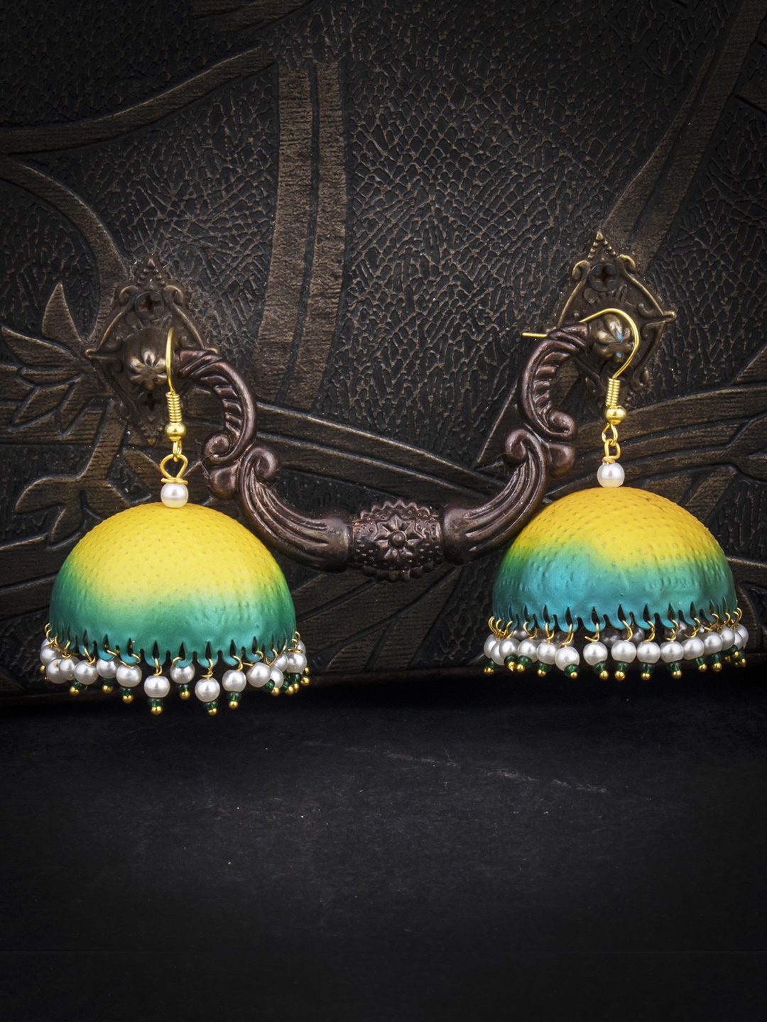 

Sukkhi Blue & Yellow Dome Shaped Jhumkas