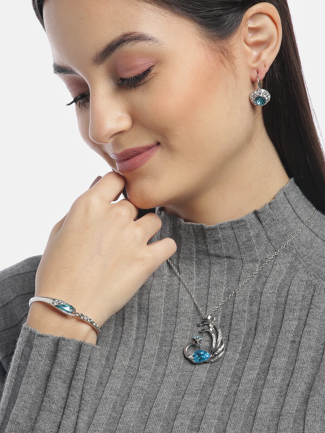 

YouBella Blue Silver-Plated Stone-Studded Jewellery Set with Bracelet