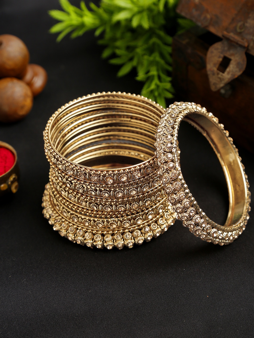 

YouBella Set of 14 Antique Gold-Plated Stone-Studded Textured Bangles