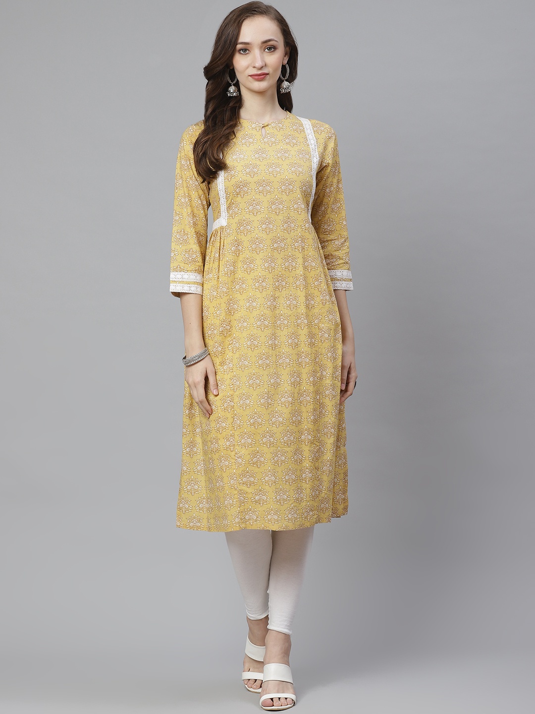 

Bhama Couture Women Yellow & Beige Ethnic Print A-Line Kurta