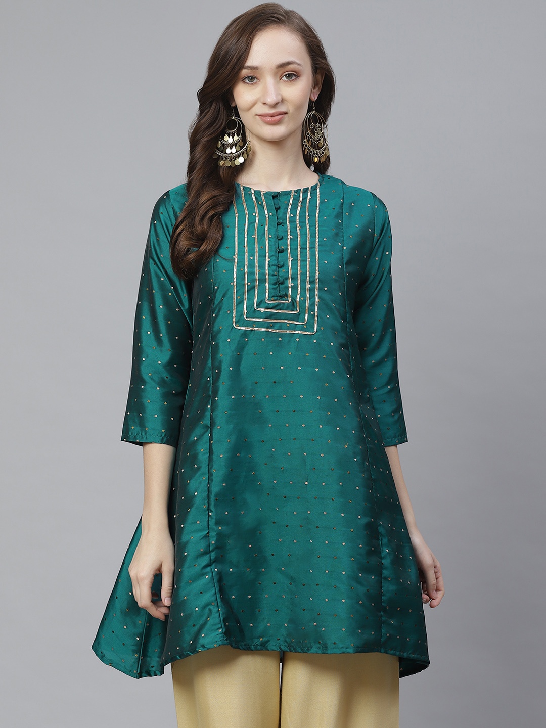 

Bhama Couture Women Green & Golden Silk Self Design Tunic
