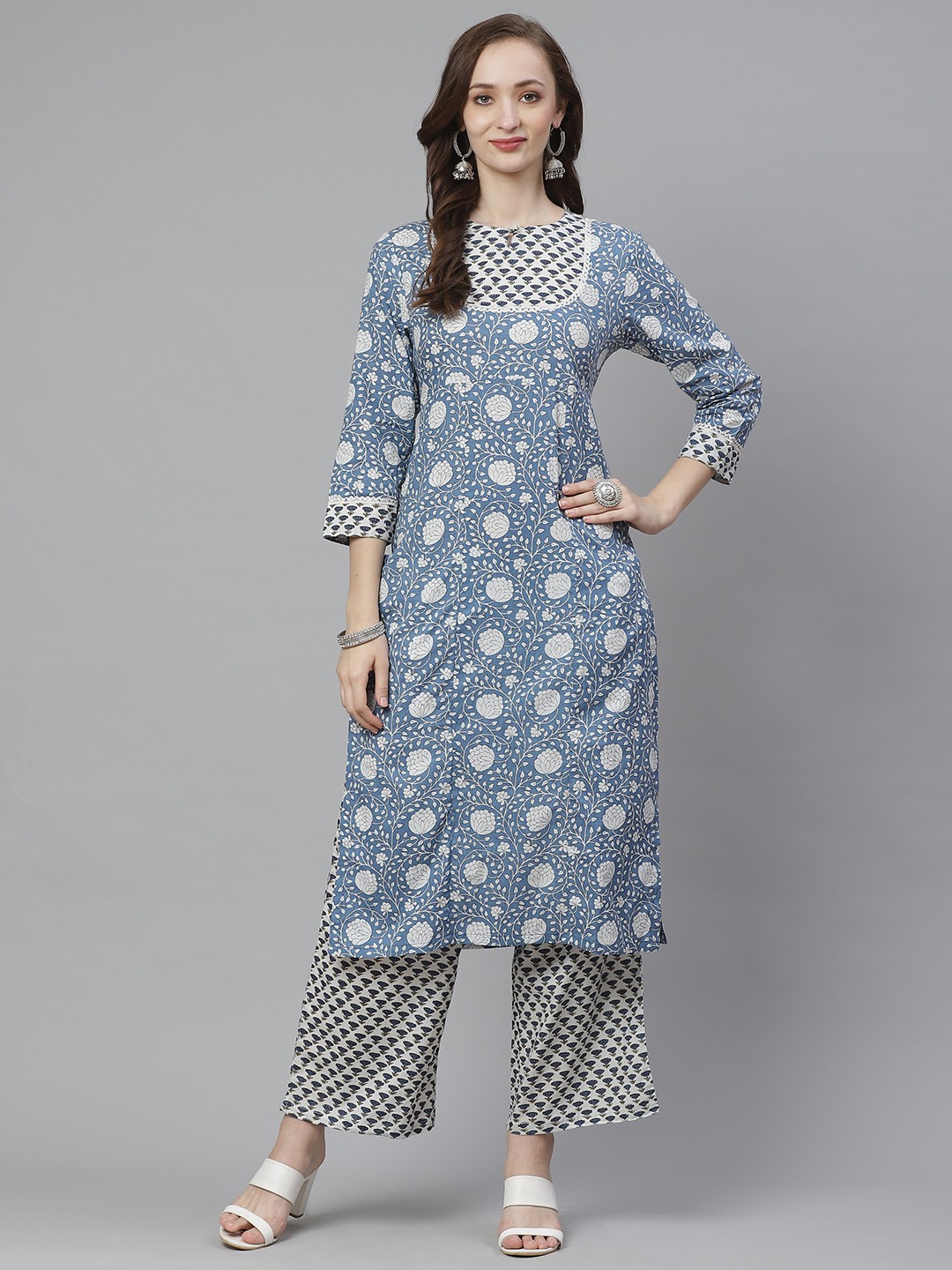 

Bhama Couture Women Blue & White Printed Kurta with Palazzos