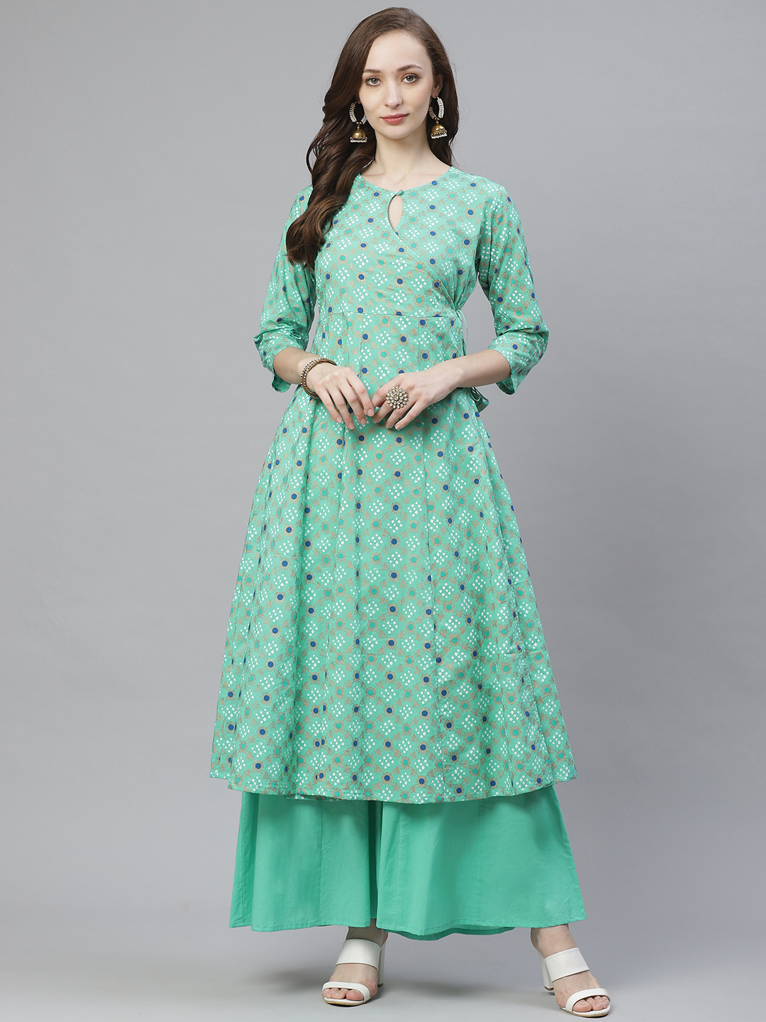 

Bhama Couture Women Green & Golden Printed Kurta with Palazzos