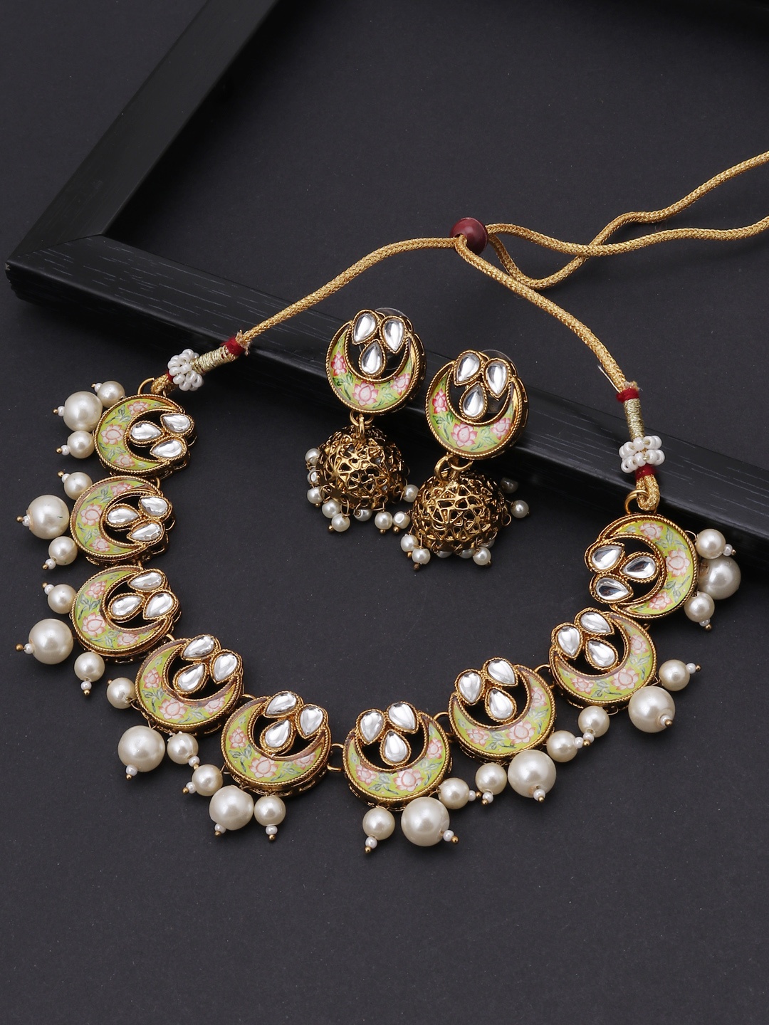 

Sukkhi Gold-Plated Green & White Kundan-Studded Pearl Meenakari Jewellery Set