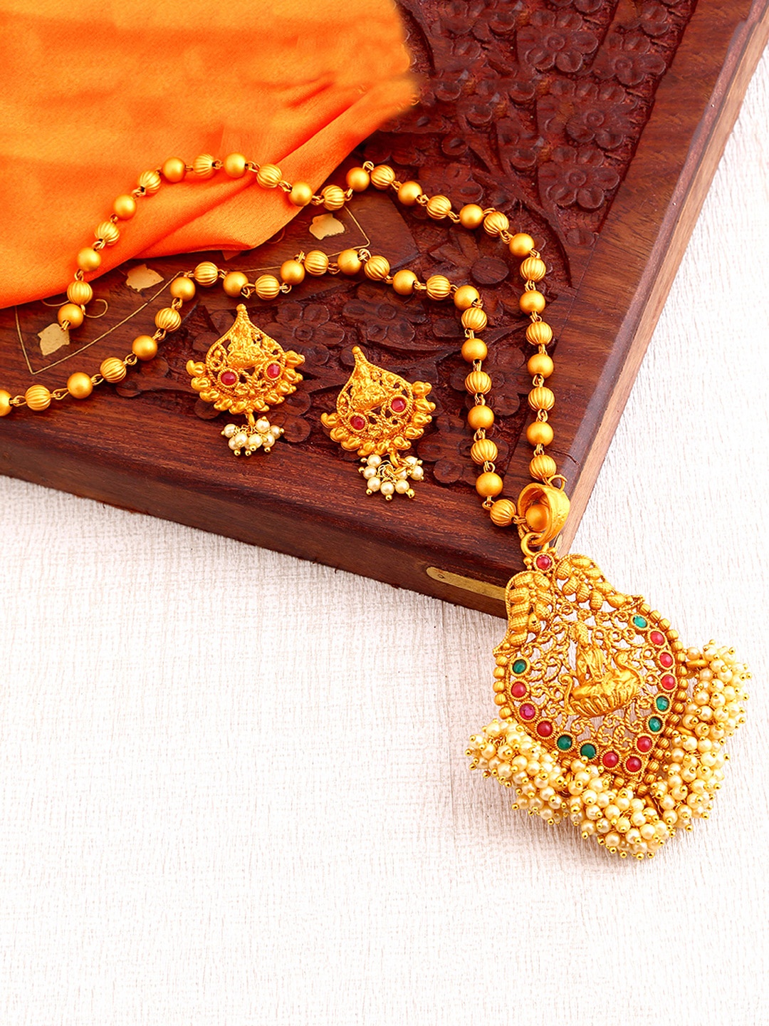 

Sukkhi Gold-Plated Off-White & Red Stone-Studded Pearl Temple Jewellery Set
