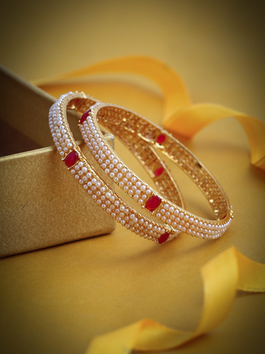 

Sukkhi Set of 2 Gold-Plated White & Red Stone-Studded Pearl Bangles