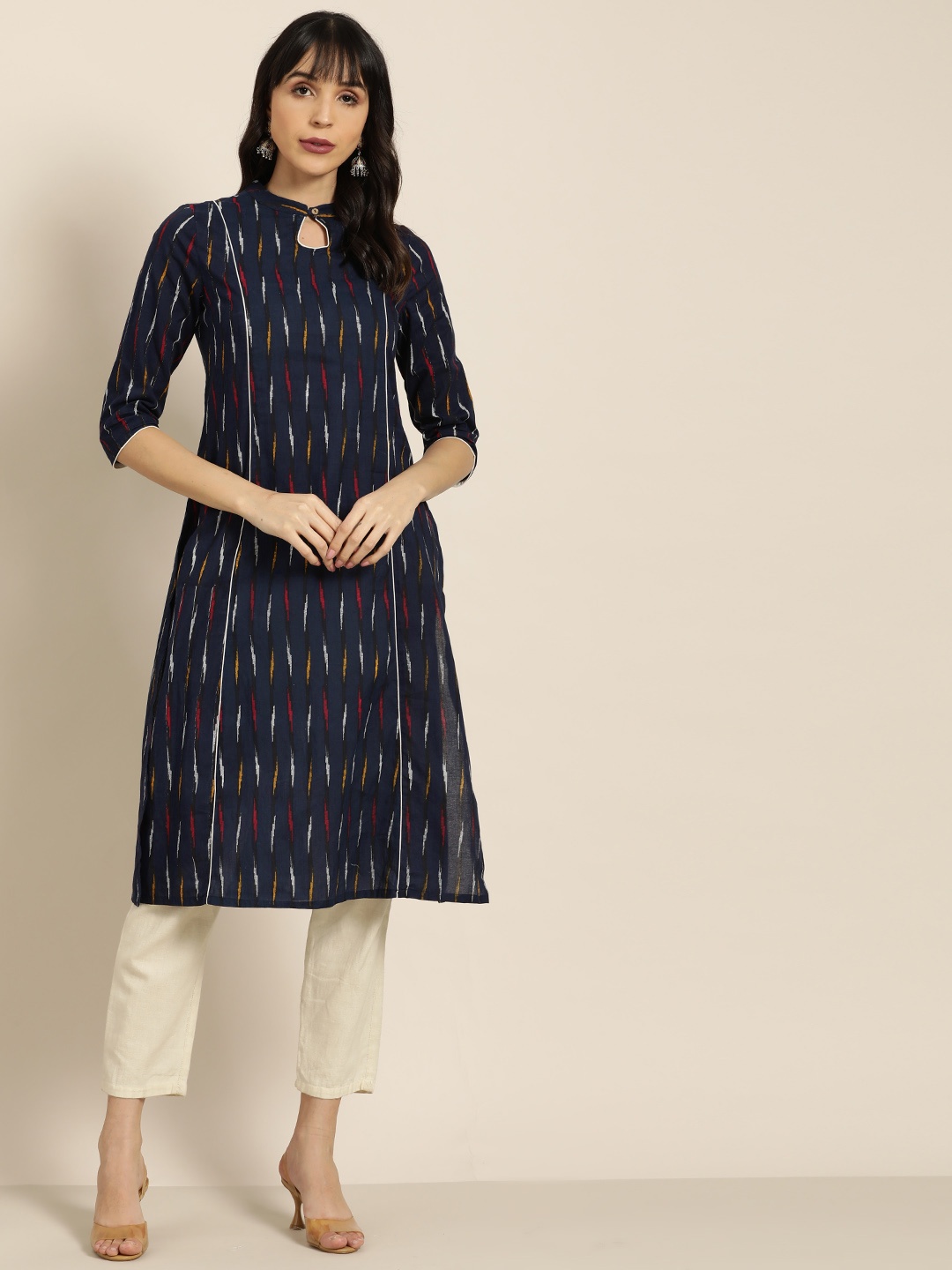 

Moda Rapido Women Navy Blue & White Striped Straight Kurta