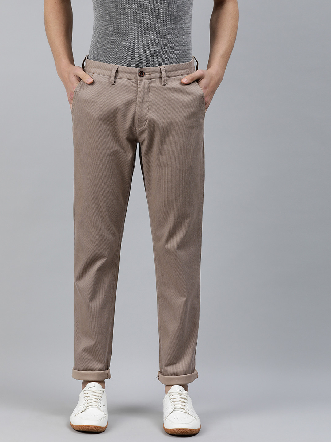 

Arrow Sport Men Beige Chrysler Slim Fit Self Design Regular Trousers